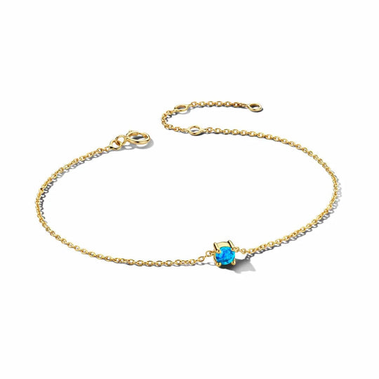 Gouden armband met geboortesteen December