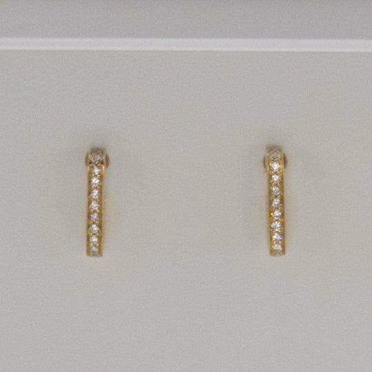 Gouden oorstekers met briljant 0.07 OP117070